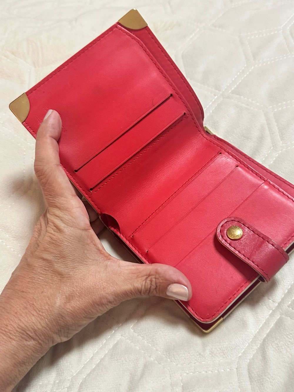 Authentic Louis Vuitton Red Pebbled Leather Snap Wallet with Gold-Tone Stud